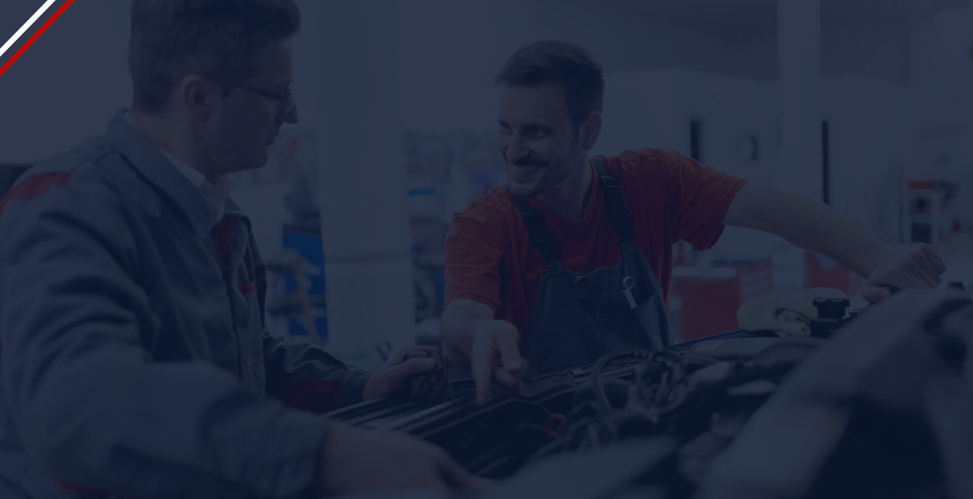 Mechanic working on a car in a garage